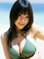 This bikini can barely contain this busty asian chicks big boobs
